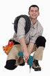 Electrician with a drill