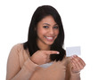 Photo: Young Woman Pointing At Visiting Card Young Woman Pointing At Visiting Card