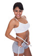 Portrait Of Young Woman Measuring Her Waistline