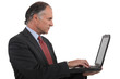 Businessman holding his laptop