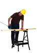 Carpenter sawing a plank