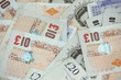 A Pile Of English £10 And £2...