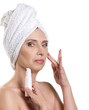 Photo: woman applying cream for face woman applying cream for face