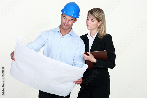 Photo: Architects with plans Architects with plans