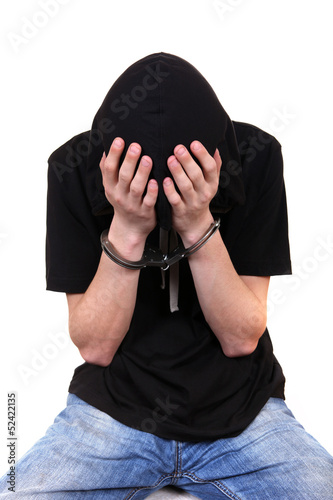 Photo: Arrested Young Man in Handcuffs Arrested Young Man in Handcuffs