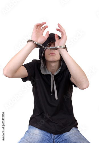 Photo: Arrested Young Man in Handcuffs Arrested Young Man in Handcuffs