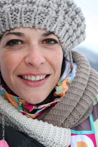 Photo: Woman dressed in warm winter clothing Woman dressed in warm winter clothing