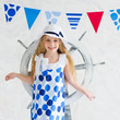Gorgeous summer girl wearing fancy spotted dress