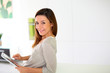 Photo: Young woman using electronic tablet Young woman using electronic tablet