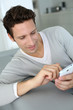 Portrait of man using smartphone