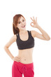 happy young fitness woman with ok gesture