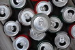 Soda and beer cans top view