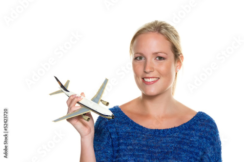 Photo: Frau mit Modellflugzeug Frau mit Modellflugzeug