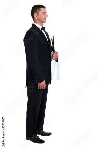 Photo: Profile view of male waiter Profile view of male waiter