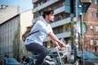 hipster young man on bike