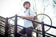 hipster young man on bike
