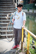 hipster young man on bike