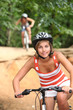 Photo: Two girls on a bicycle Two girls on a bicycle