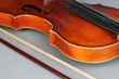 Classical violin on grey background