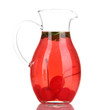 Cherry drink in pitcher isolated on white.