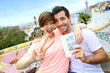 Couple of travelers visiting Guell Park