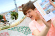 Portrait of cheerful girl visiting Barcelona