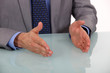 Businessman's hands on a desk