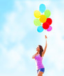 Photo: Woman with colorful balloons Woman with colorful balloons