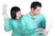 Foto: Surgeon and assistant Surgeon and assistant
