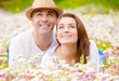 Photo: Young family on camomile glade Young family on camomile glade