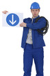 Menacing traffic guard holding a sign