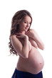 Portrait of beautiful topless pregnant woman