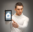Foto: man pointing at tablet pc with email icon man pointing at tablet pc with email icon