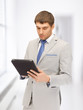 calm man with tablet pc computer