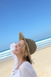 Woman walking along beach