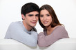 Couple sitting on their couch