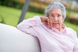 Foto: Retired woman relaxing outdoors Retired woman relaxing outdoors