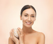 woman with salt ball for bathing