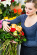 Female florist in flower shop