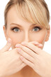 woman covering her mouth