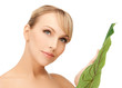 woman with green leaf