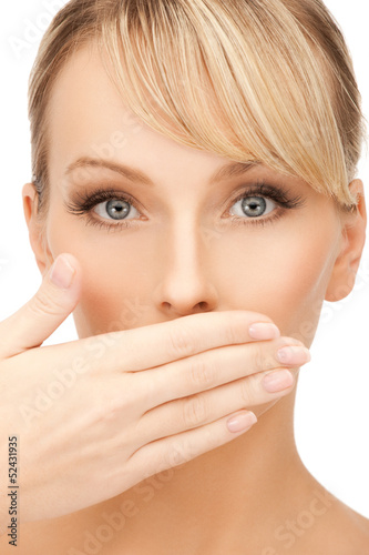 Photo: woman covering her mouth woman covering her mouth