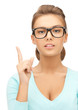 woman in glasses with finger up