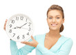 Foto: woman with wall clock woman with wall clock