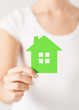 woman hands holding green house