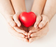 woman and man hands with heart
