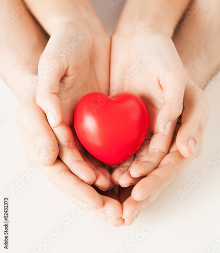 Photo: woman and man hands with heart woman and man hands with heart
