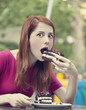 Style redhead girl with cake and cup