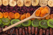 Wooden spoon with dried apricots