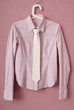 Stripy  blouse is on hanger.